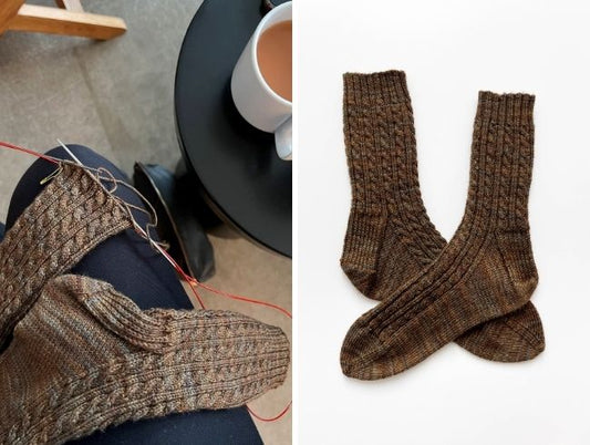 Brown cabled handknit BFF Sock by Cookie A in Sweet Georgia Tough Love Sock in Lichen, shown in progress and finished