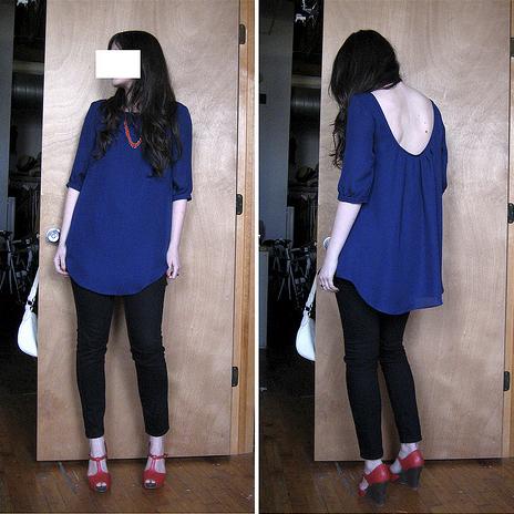 Blue Fayne tunic with three-quarter sleeves and low scoop back, shown front and back with black leggings and coral heels