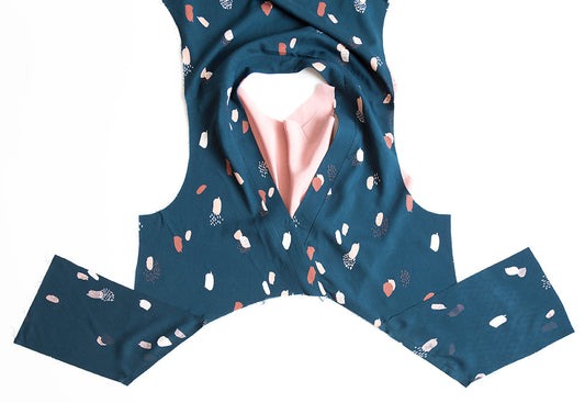 Felix Dress pocket pieces in teal with abstract print, laid flat and folded to show pocket placement with pink lining visible