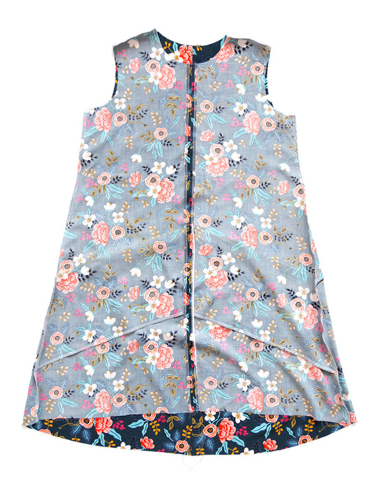 Farrow Dress in gray floral with pink roses, flat lay inside out showing center front seam and hem facing in navy floral
