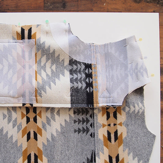 Cascade Duffle Coat wool bodice panels in gold and gray geometric print pinned showing shoulder and side seam construction