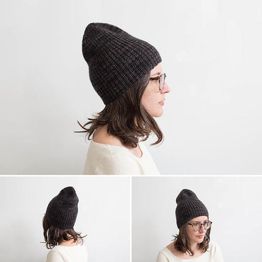 Black ribbed-knit beanie shown from three angles on a person wearing a cream-colored long-sleeved top