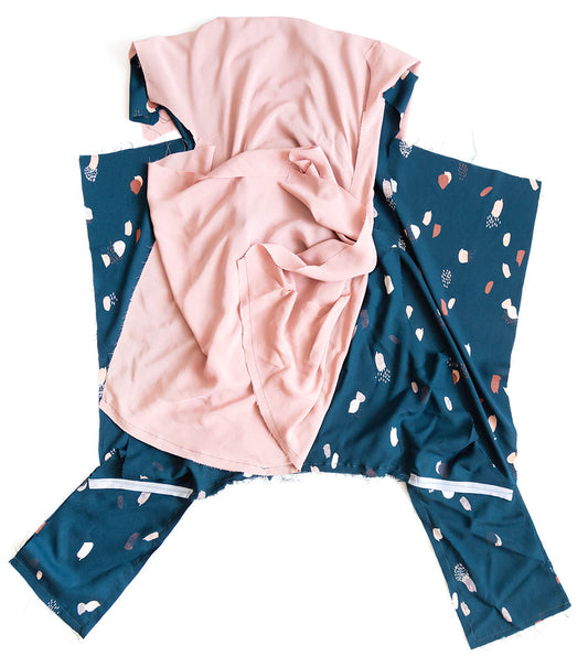 Felix Dress in teal abstract print with pink lining, showing bodice pieces pinned to skirt panels during construction