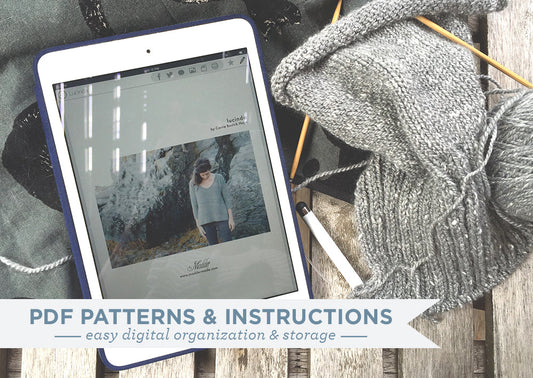 iPad showing Lucinda knitting pattern beside gray knit in progress with wooden needles, promoting PDF pattern storage