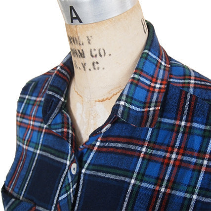 Archer Button Up Shirt in navy plaid with white buttons displayed on a dress form