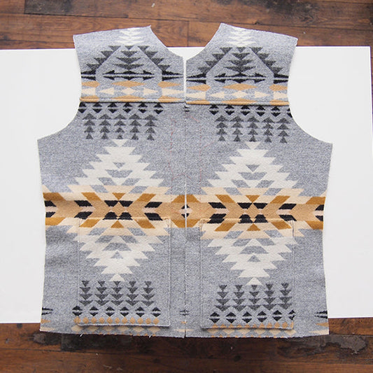 Cascade Duffle Coat front pieces in gray and gold Pendleton wool geometric print, laid flat showing patch pockets attached