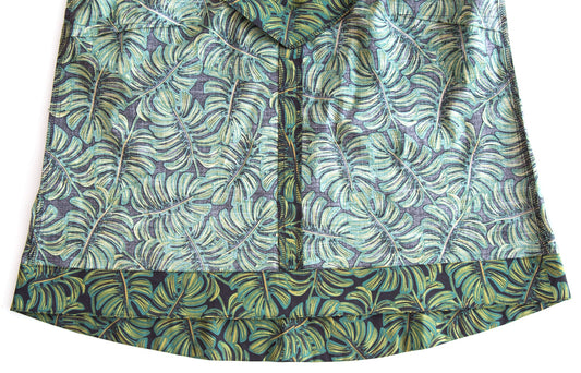 Hadley Top with botanical leaf print in charcoal, green, and cream showing the finished hem facing