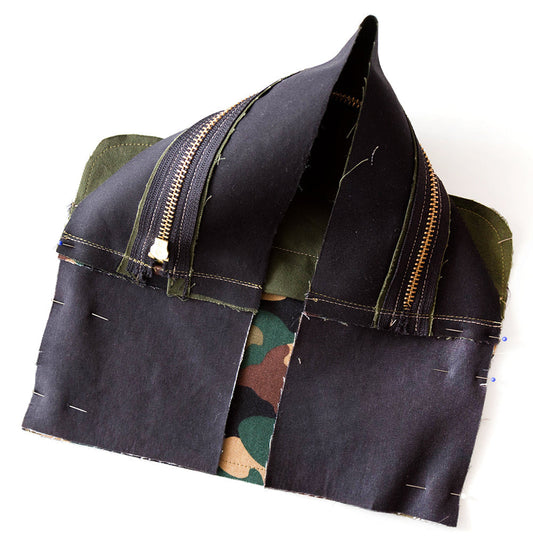 Portside Dopp Kit construction showing wrong side of interfaced side and zipper panels pinned to front with brass zipper