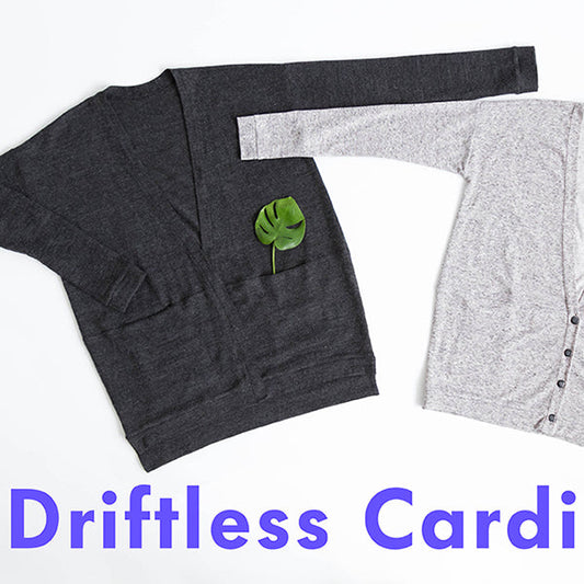 Driftless Cardigan sewing pattern in charcoal and heather gray, featuring drop shoulders, front pockets, and button placket
