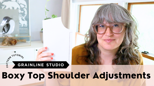 Grainline Studio pattern tutorial thumbnail with Jen Beeman holding sewing pattern piece, titled Boxy Top Shoulder Adjustments