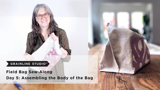 YouTube thumbnail for Field Bag Sew-Along Day 5: Assembling the Body of the Bag, mauve print bag, wrong side out