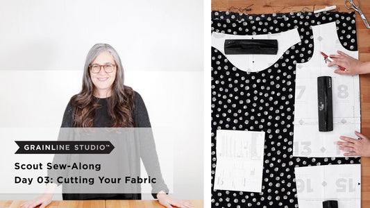 YouTube thumbnail for Scout Sew-Along Day 03: Cutting Your Fabric, pattern pieces laid on polka dot fabric with weights