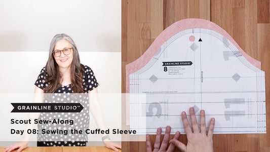 YouTube thumbnail for Scout Sew-Along Day 08: Sewing the Cuffed Sleeve, pattern piece pinned to pink fabric