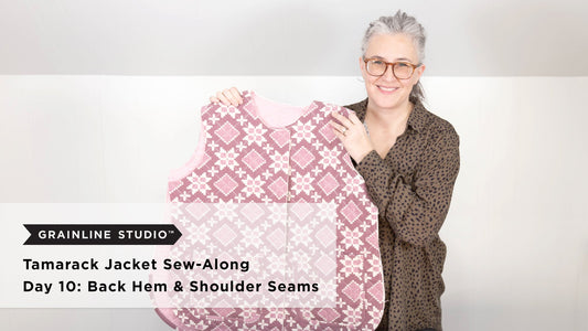 YouTube thumbnail for Tamarack Jacket Sew-Along Day 10: Back Hem & Shoulder Seams, woman holding up pink quilted jacket