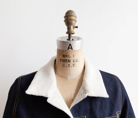 Thayer Jacket in dark denim with white sherpa collar on dress form, showing collar assembly and topstitching detail