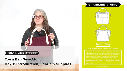 Grainline Studio Town Bag Sew-Along Day 1 thumbnail with Jen Beeman holding burgundy Town Bag and green pattern envelope