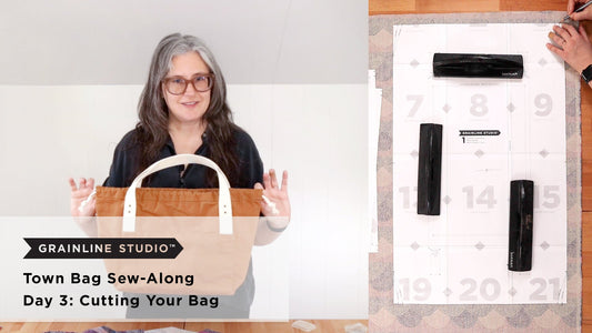 Grainline Studio Town Bag Sew-Along Day 3 thumbnail with toffee canvas Town Bag and pattern pieces laid out on cutting mat