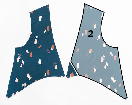 Felix Dress front piece in teal abstract print beside piece 2 pattern template in dusty blue for trimming the lower corner