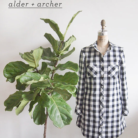 Alder Archer combo in navy and white gingham on dress form next to fiddle leaf fig, with alder and archer text overlay