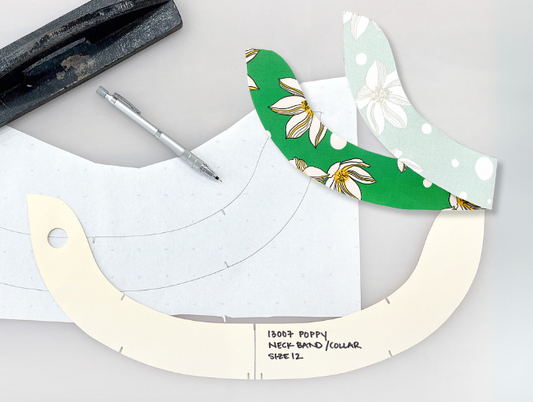 Poppy Dress neckband collar pattern pieces in green floral and mint polka dot fabric with fusible interfacing template