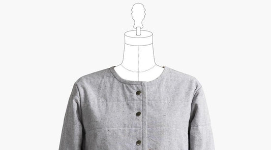 Tamarack Jacket in gray cotton-linen blend with snap front closure, displayed on an illustrated dress form