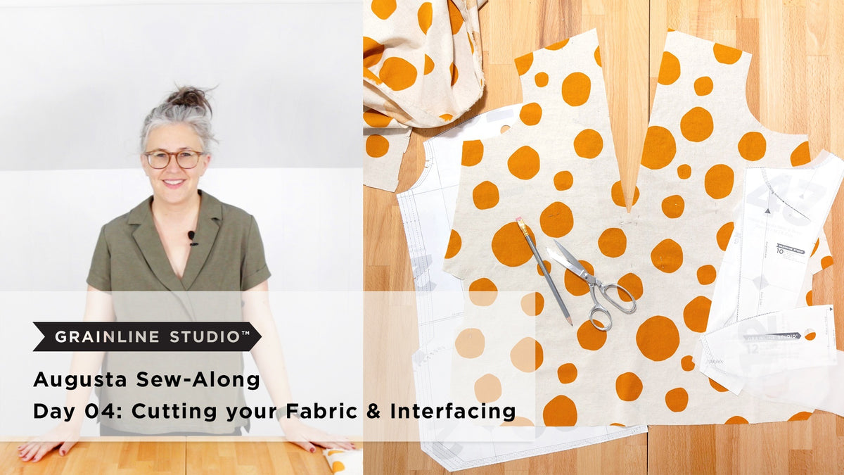 Woman smiling beside an Augusta front cut from mustard dot fabric with paper pattern pieces, a pencil, and scissors