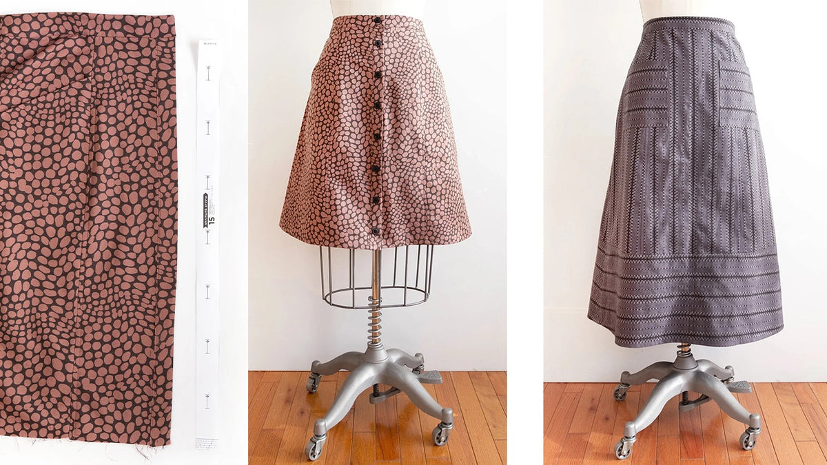 Pink dot print fabric with button template on left, completed button-front skirt on dress form center, gray geometric skirt on righ