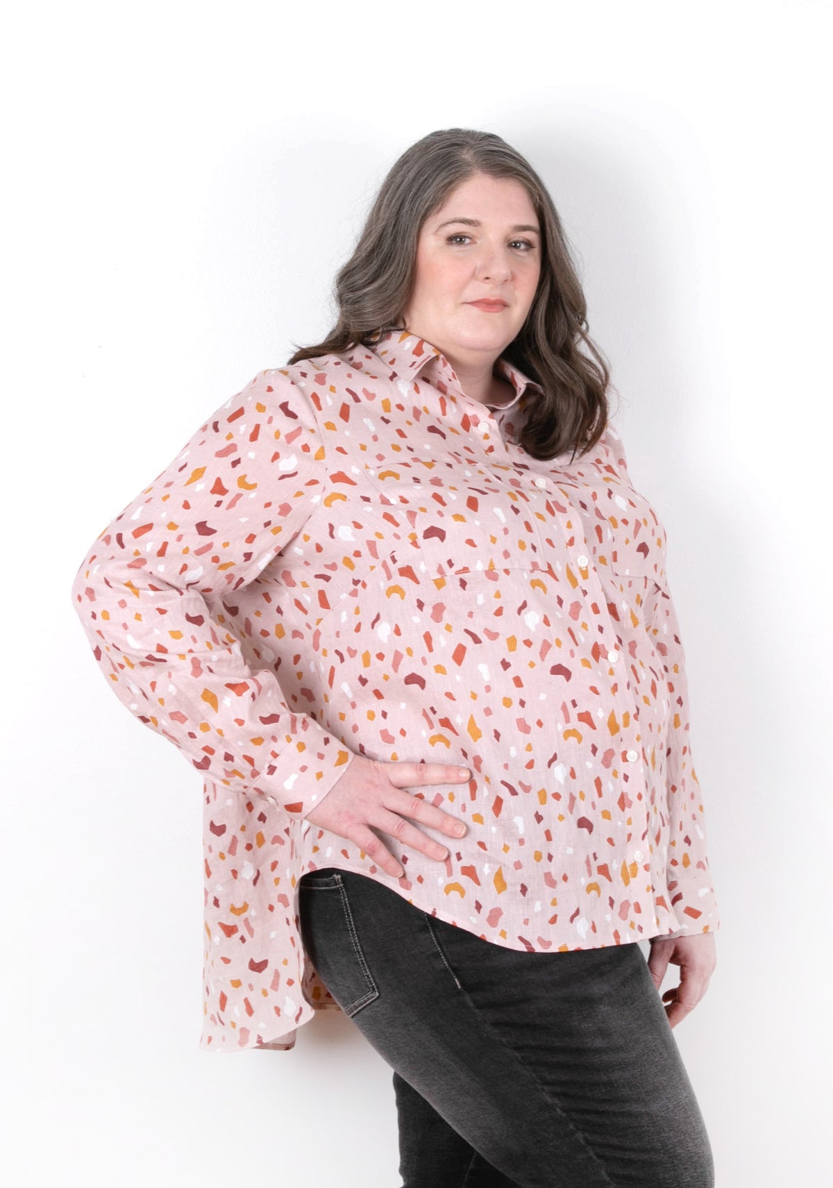 Archer Button Up View B, angled front view with gathered back, pink print fabric, size 14-32.