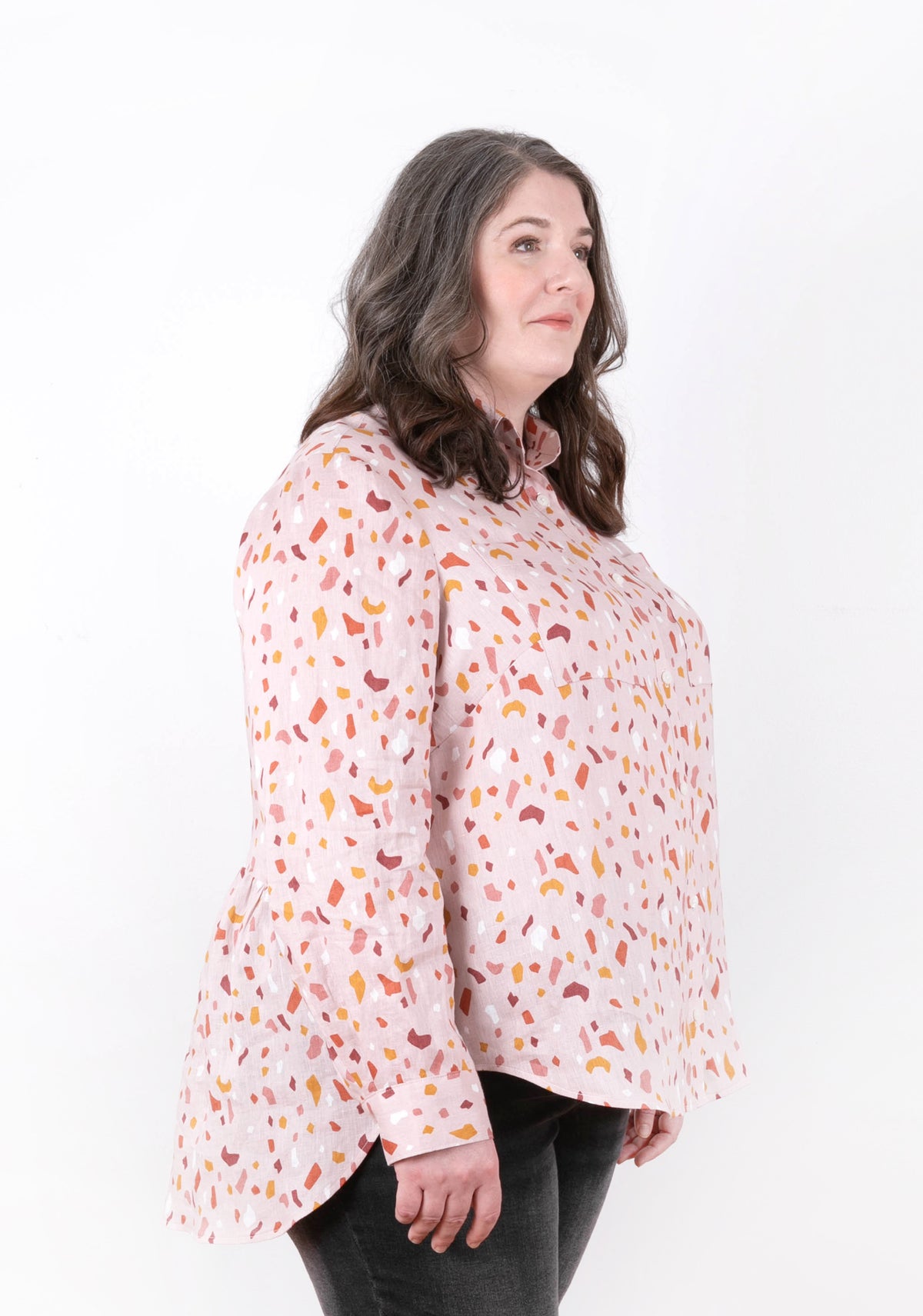 Archer Button Up View B, left side view with gathered back, pink print fabric, size 14-32.