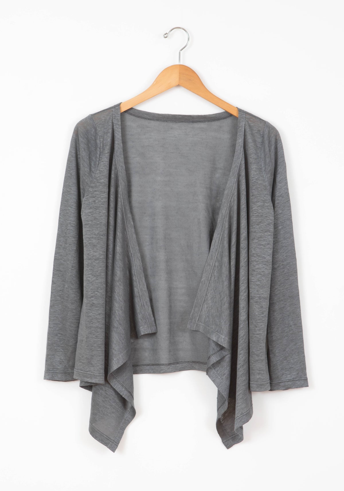 Grey Lark Cardigan displayed flat on hanger with open front and relaxed silhouette.