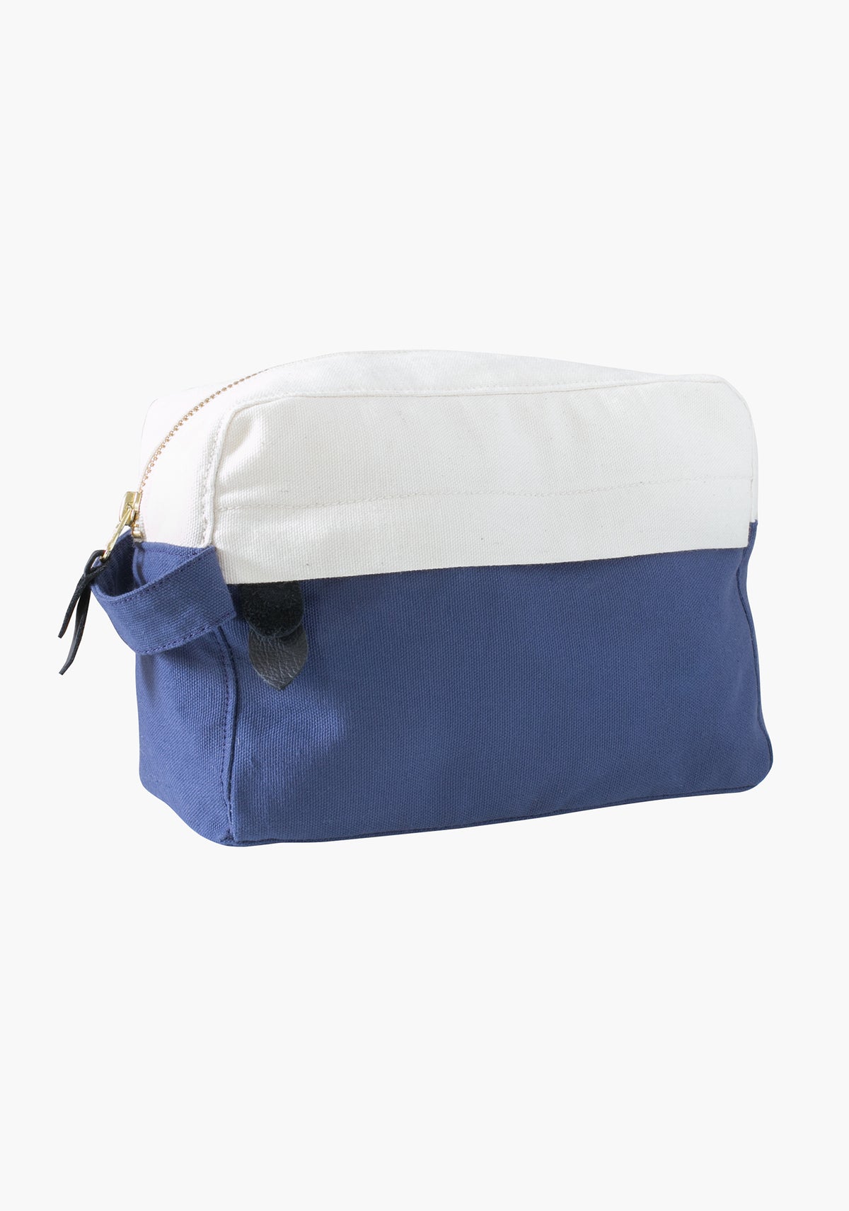 Side view of Portside dopp kit in blue and natural canvas with gold zipper.