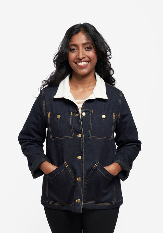 Model: Size 8, 5'5" | Front view of model wearing dark denim Thayer Jacket with white collar and brass snaps.