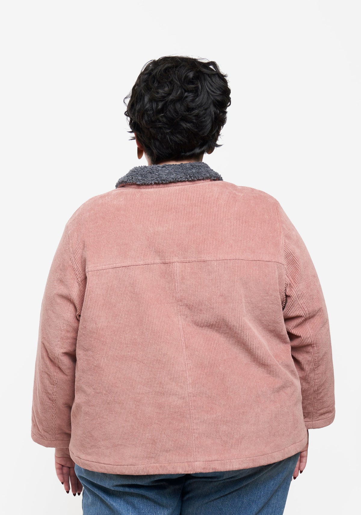 Back view of Thayer Jacket showing yoke, center seam, and A-line silhouette.